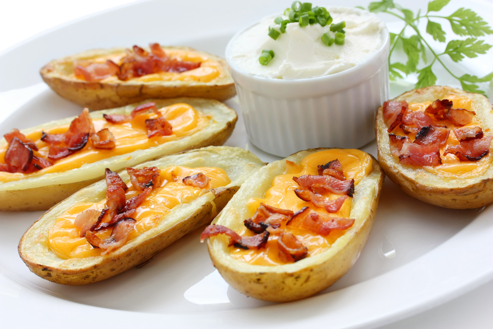 Baked potatoes with cheese and bacon.